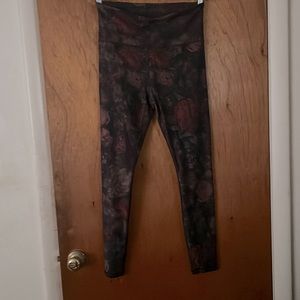 Black and floral Athleta tights in medium